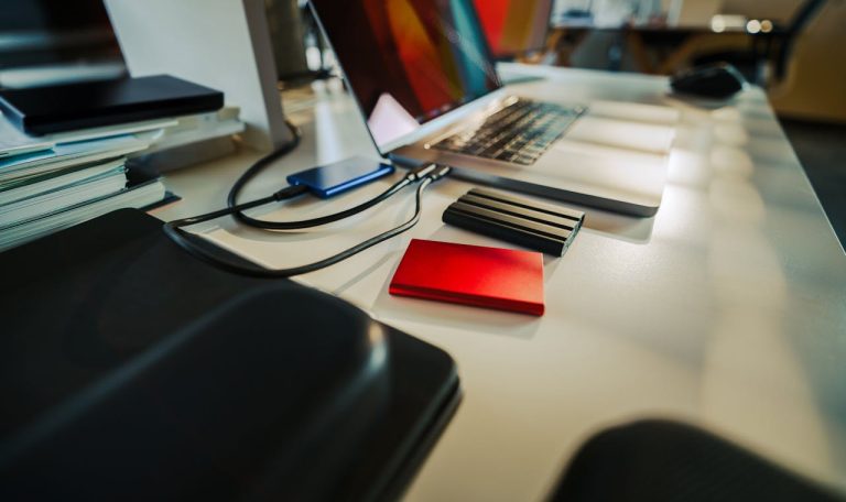 Several external storage devices shown connected to a laptop